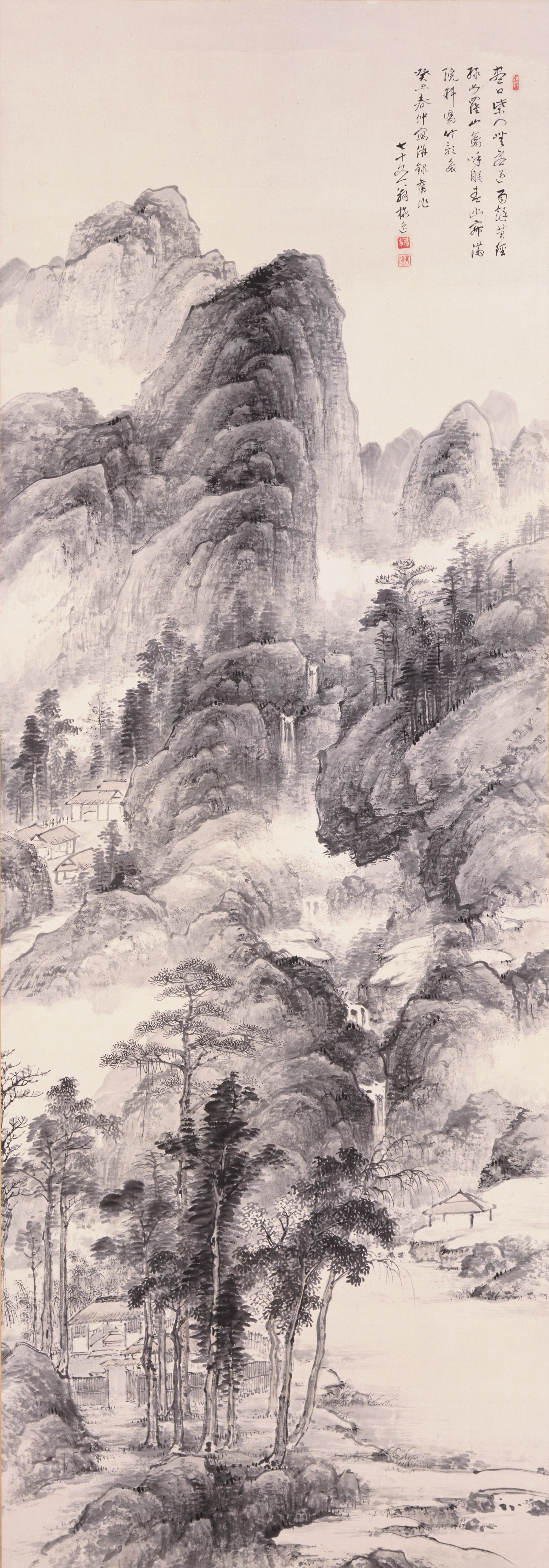渓谷の家々のある山水