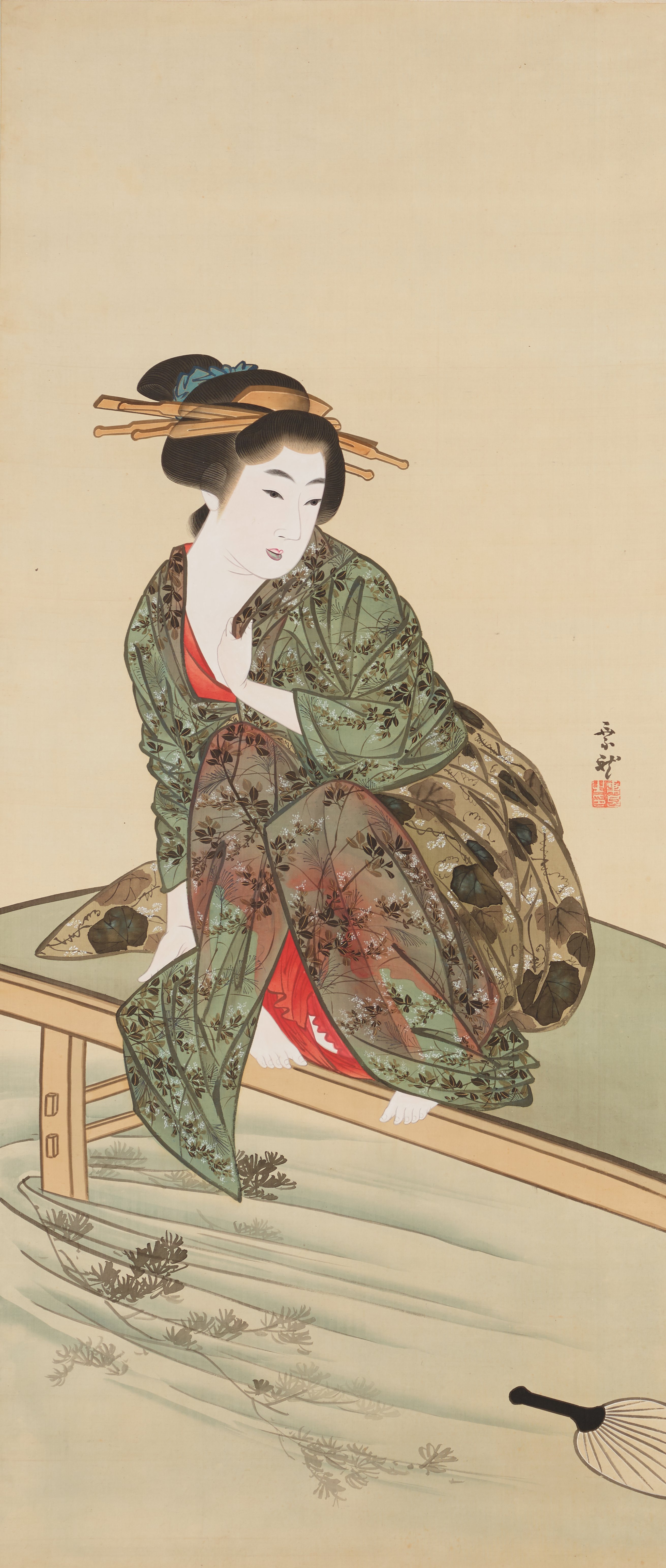 小川のほとりの女