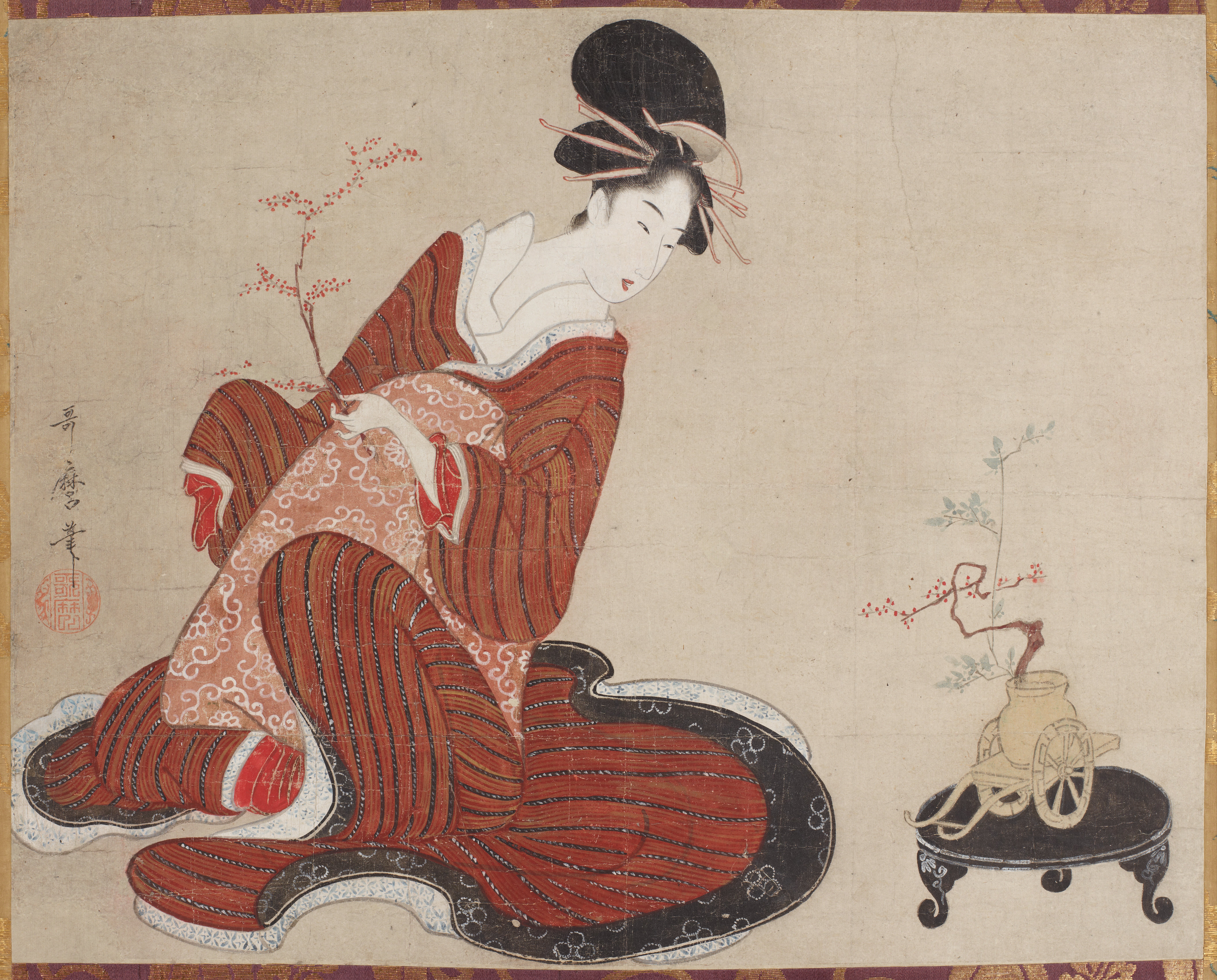 花を生ける女