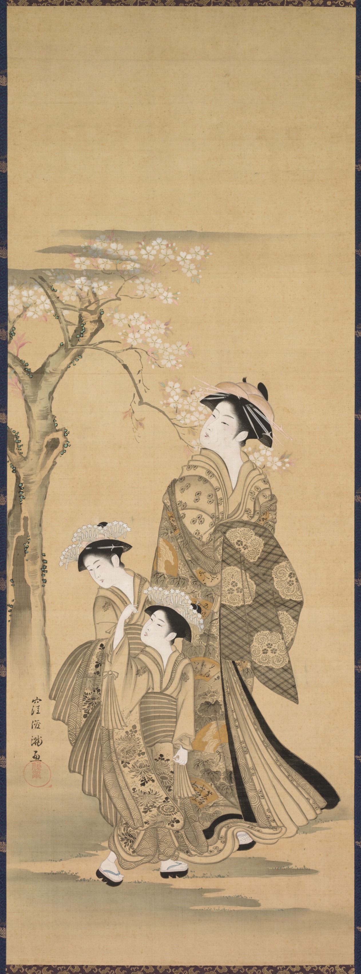女性と2人の子ども