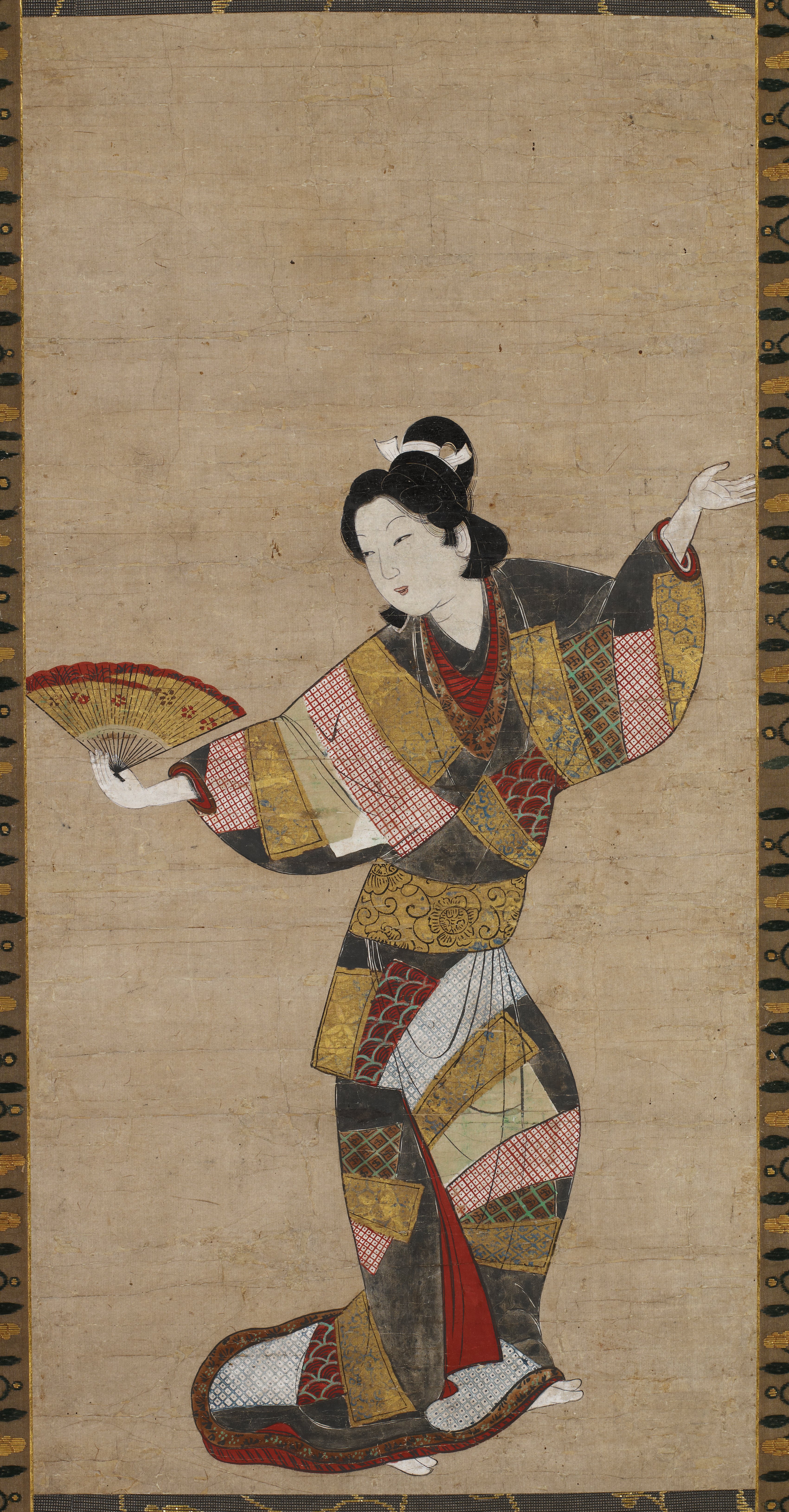 扇を持つ踊り手